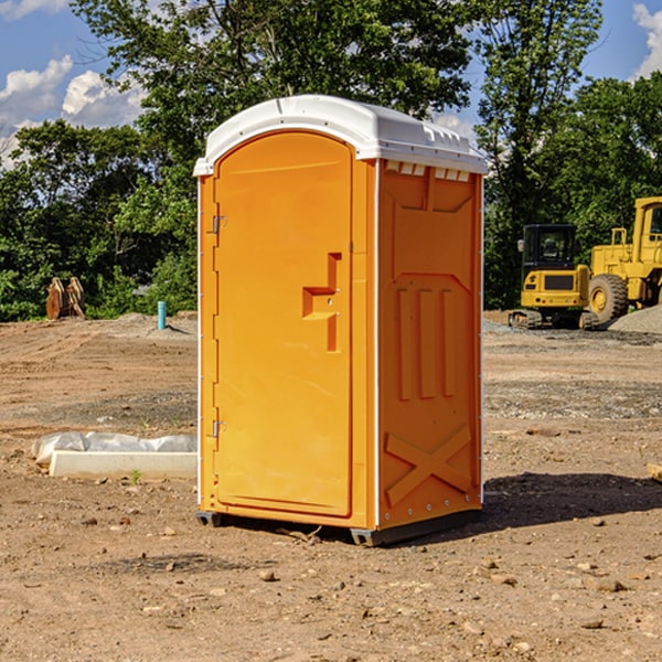 what is the cost difference between standard and deluxe portable restroom rentals in Enterprise OR